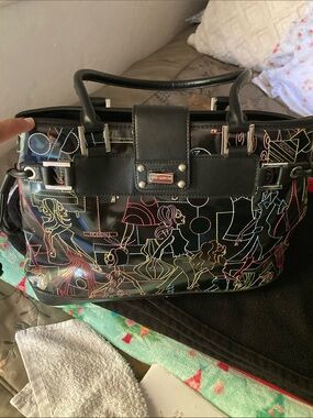 BCBGirls Black Shoulder Bag with Multicolor Stitching Line Art